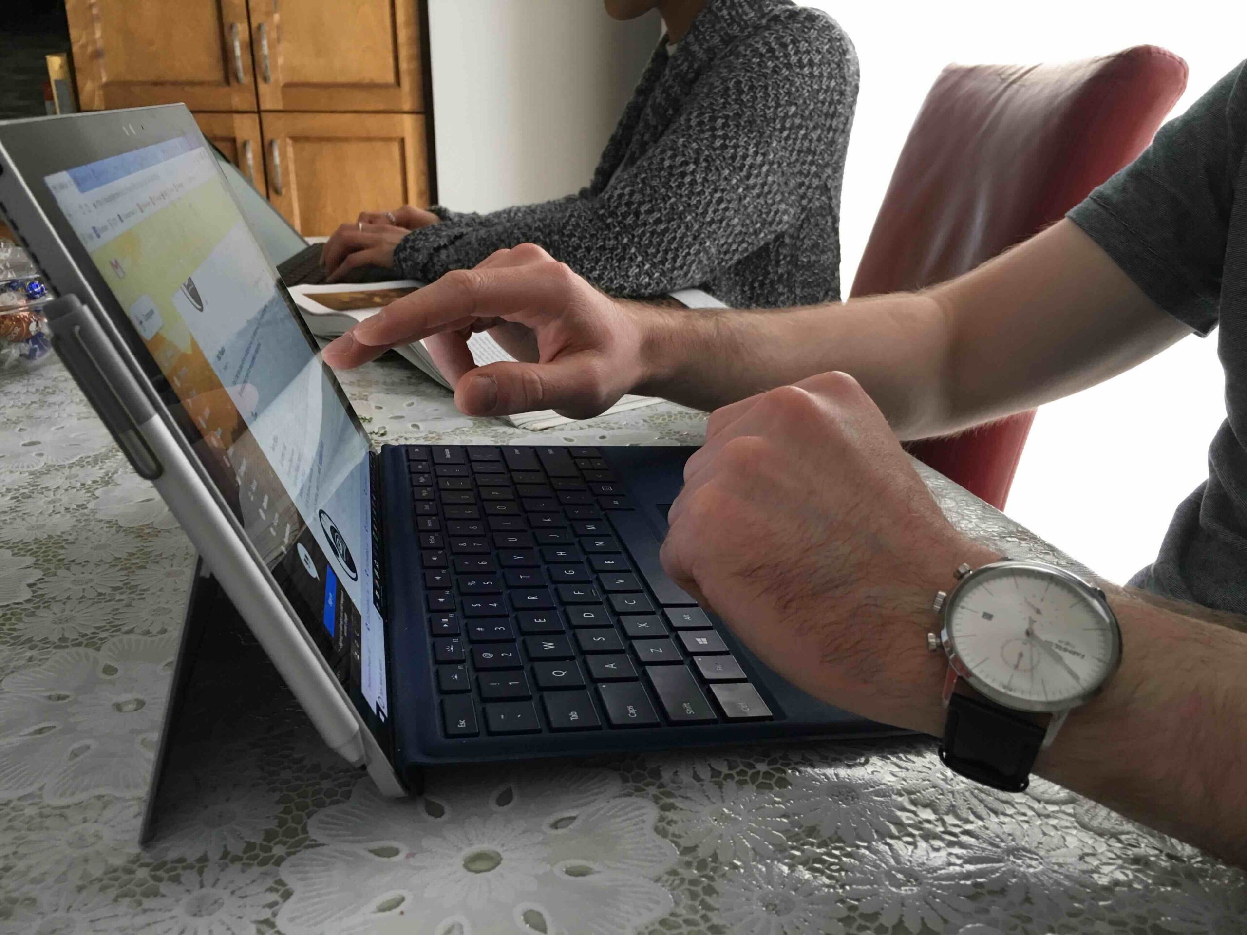 Team members working at their computers
