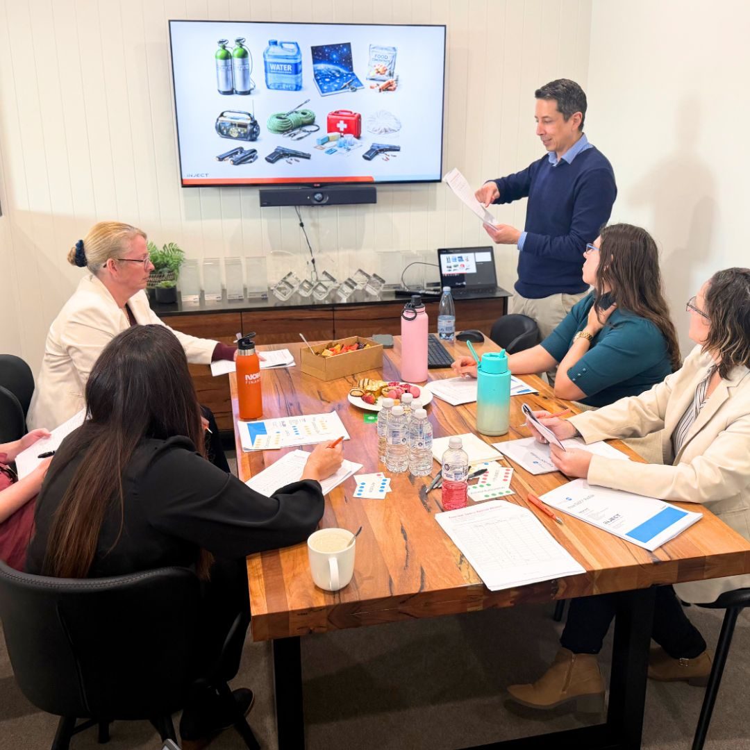 Inject consultant leading a training session with a client team